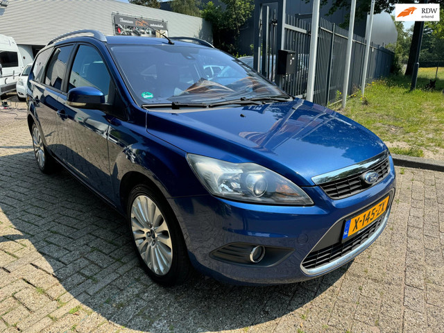 Foto 2 van Ford Focus Wagon 1.8 Titanium Flexi Fuel clima, elec pakket, alu wielen, getint glas navigatie, 107.