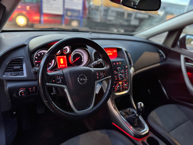 Foto 4 van Opel Astra Sports Tourer 1.4 Cosmo / airco / cruise.control / pdc / elek.pakket / lmv / nap....