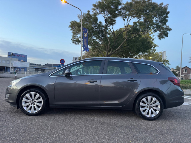 Foto 7 van Opel Astra Sports Tourer 1.4 Cosmo / airco / cruise.control / pdc / elek.pakket / lmv / nap....