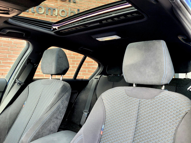 Foto 4 van BMW 1-serie 118i M-Sport, Schuifdak, HiFi (NL-auto NAP)
