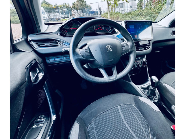 Foto 2 van Peugeot 208 1.2 PureTech Blue Lease Premium/D-RIEM V.V/NW APK/TOP STAAT/