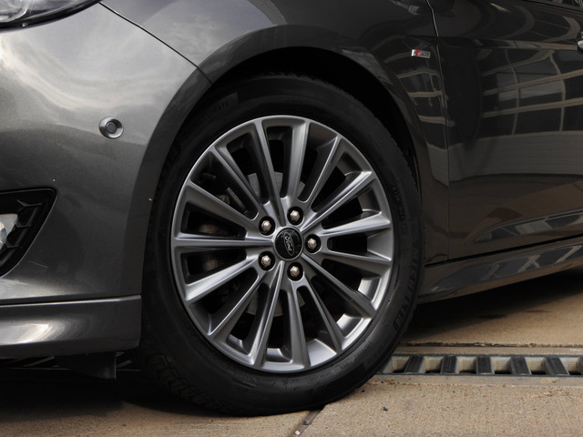 Foto 7 van Ford Focus Wagon 1.0 ST-Line 125PK | Cruise | Trekhaak | Bluetooth | Airco | Navi | LM Velgen | NAP