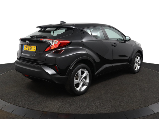 Foto 10 van Toyota C-HR 1.2 Dynamic | 1.300kg trekgewicht! | Camera | Keyless Start | Electrisch inklapbare buit