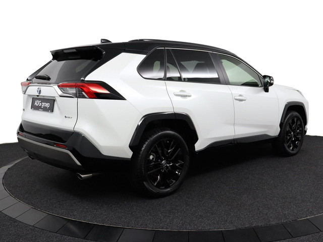 Foto 10 van Toyota RAV4 2.5 Hybrid AWD Bi-Tone | Apple Carplay/Android Auto | elektrisch bedienbare achterklep |
