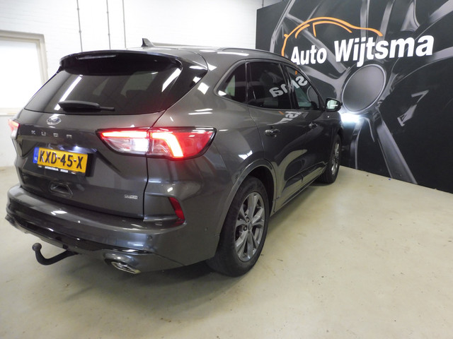 Foto 3 van Ford Kuga 2.5 PHEV ST-Line X Afn. Tr haak | Winterpack | LMV 18" | Zw hemel | Stof/alcantara