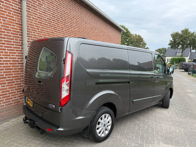 Foto 6 van Ford Transit Custom 300 2.0 TDCI L3H2 Limited Automaat , Camera, Cruise control, omvormer, 3 zits