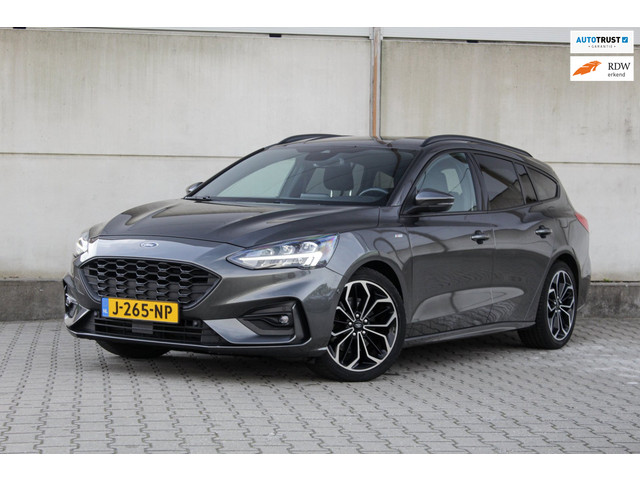 Foto 10 van Ford Focus Wagon 1.0 EcoBoost Titanium Business - ST-Line - Automaat - Camera - Trekhaak - Stuurverw