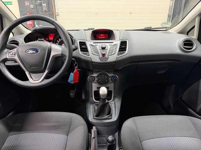 Foto 8 van Ford Fiesta 1.25 Limited Nap/Airco/5Drs/APK 10-2027!