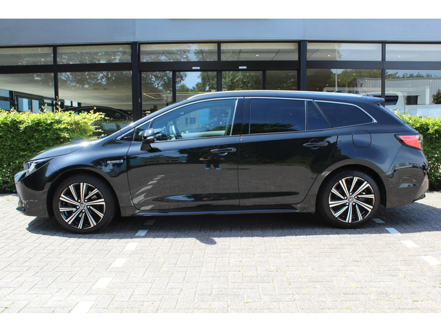 Foto 8 van Toyota Corolla Touring Sports 2.0 Hybrid Business Plus | Rijklaar | Apple/Android | Trekhaak | Stoel