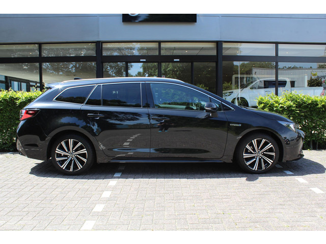 Foto 4 van Toyota Corolla Touring Sports 2.0 Hybrid Business Plus | Rijklaar | Apple/Android | Trekhaak | Stoel