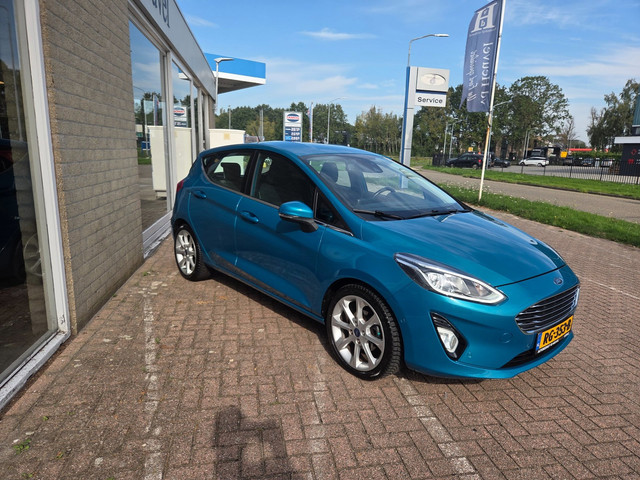 Foto 8 van Ford Fiesta 1.0 EcoBoost Titanium 100PK *Camera*Carplay*Adaptive cruise* voorruit verwarming * Rijkl