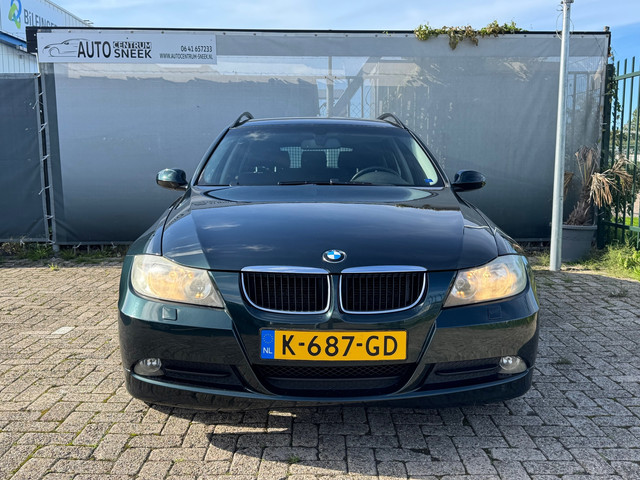 Foto 3 van BMW 3-serie Touring 318i - Airco-Cruise-PDC- APK 03-27