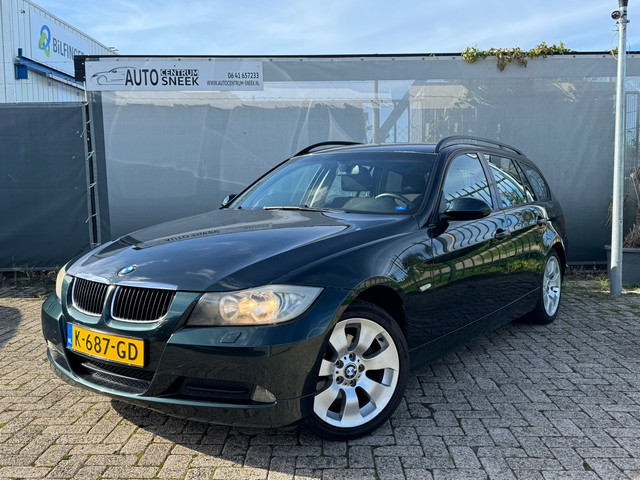 Foto 4 van BMW 3-serie Touring 318i - Airco-Cruise-PDC- APK 03-27