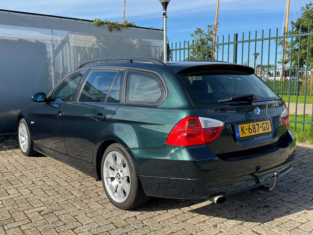 Foto 6 van BMW 3-serie Touring 318i - Airco-Cruise-PDC- APK 03-27