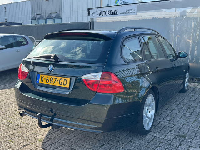 Foto 8 van BMW 3-serie Touring 318i - Airco-Cruise-PDC- APK 03-27