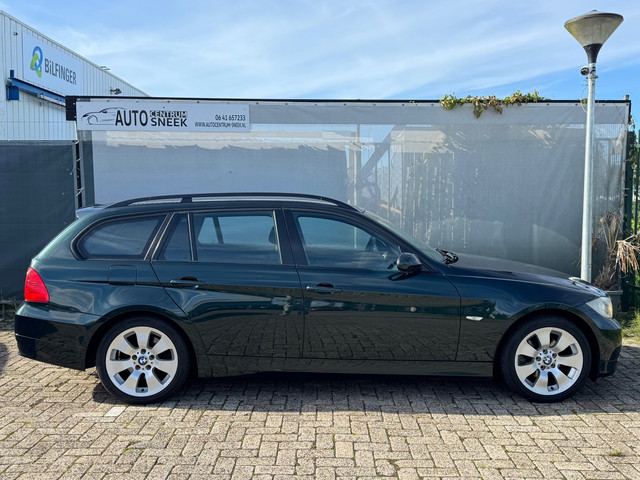 Foto 9 van BMW 3-serie Touring 318i - Airco-Cruise-PDC- APK 03-27