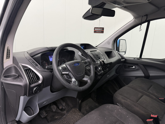 Foto 9 van Ford Transit Custom 2.2TDCI Lang | APK 11-26 | Airco | Trekhaak | 3-Zits