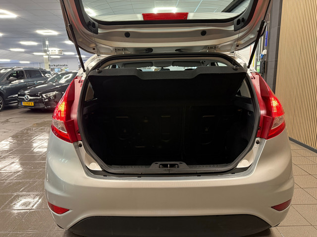 Foto 8 van Ford Fiesta 1.25 Titanium * 77.763 km + NAP / Airco / LM Velgen / NL Auto *