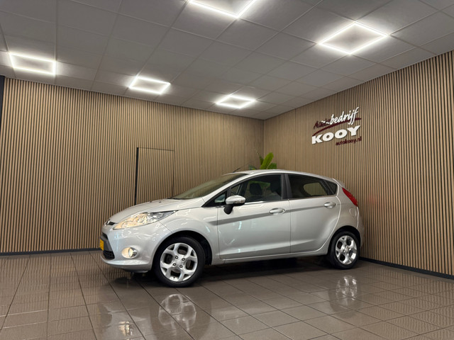 Foto 4 van Ford Fiesta 1.25 Titanium * 77.763 km + NAP / Airco / LM Velgen / NL Auto *