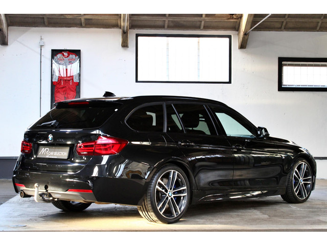 Foto 4 van BMW 3-serie Touring 318i High Executive M Sport | 19" | HUD | Panoramadak | Trekhaak | NL Geleverd