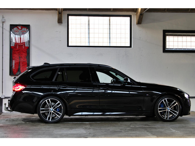 Foto 2 van BMW 3-serie Touring 318i High Executive M Sport | 19" | HUD | Panoramadak | Trekhaak | NL Geleverd