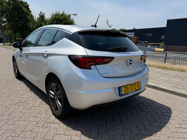 Foto 4 van Opel Astra 1.4 Turbo 120 Jaar Edition_AUTOMAAT_AIRCO_NETTE AUTO