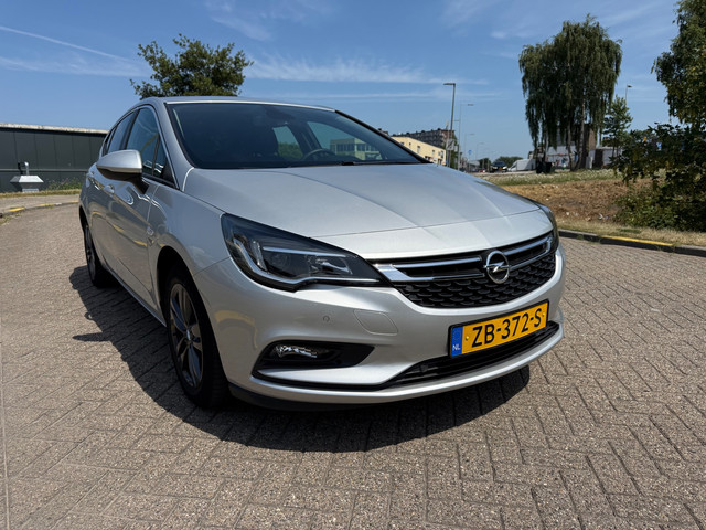 Foto 2 van Opel Astra 1.4 Turbo 120 Jaar Edition_AUTOMAAT_AIRCO_NETTE AUTO