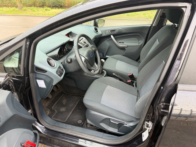 Foto 4 van Ford Fiesta 1.25 Limited airco 4-deurs org NL