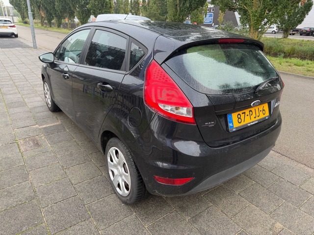 Foto 2 van Ford Fiesta 1.25 Limited airco 4-deurs org NL