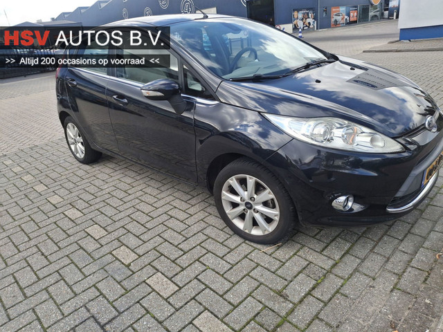 Foto 2 van Ford Fiesta 1.25 Ghia airco LM 4-deurs org NL