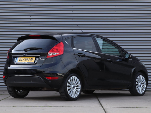 Foto 10 van Ford Fiesta 1.25 Titanium *Klimaatreg.*Parkeersens.*