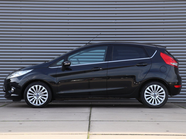 Foto 8 van Ford Fiesta 1.25 Titanium *Klimaatreg.*Parkeersens.*