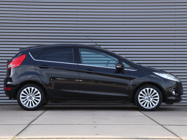 Foto 4 van Ford Fiesta 1.25 Titanium *Klimaatreg.*Parkeersens.*