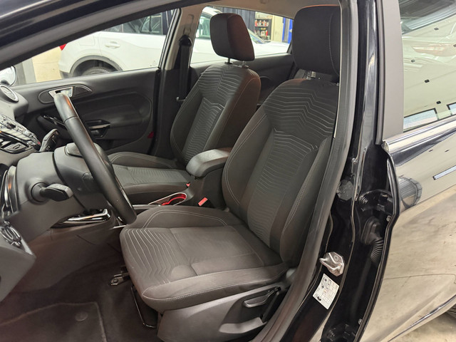 Foto 8 van Ford Fiesta 1.0 Titanium cruise control riem vervangen dealer onderhouden airco
