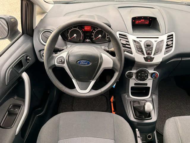 Foto 6 van Ford Fiesta 1.25 Limited, AIRCO, APK TOT 11-09-27, ELEK-RAMEN, RADIO-CD-MP3-AUX, ISOFIX, AIRBAGS, CE
