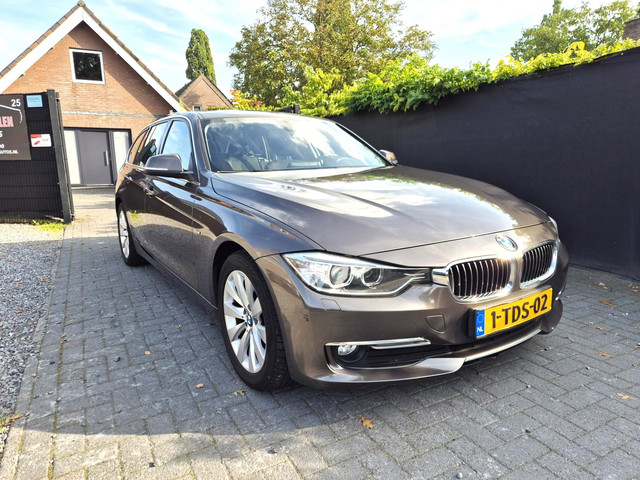 Foto 3 van BMW 3-serie Touring 316i Executive Upgrade Navi Clima Cruise