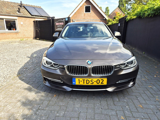 Foto 4 van BMW 3-serie Touring 316i Executive Upgrade Navi Clima Cruise