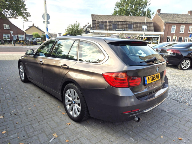 Foto 9 van BMW 3-serie Touring 316i Executive Upgrade Navi Clima Cruise