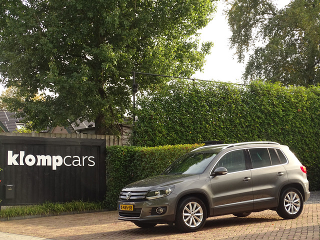 Foto 10 van Volkswagen Tiguan 1.4 TSI Lounge | Camera | Cruise | All-season | Stoelverw. | Elekspieg.