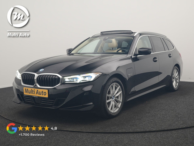 Foto 2 van BMW 3 Serie Touring 320e Luxury Line Facelift PHEV Dealer O.H. | Trekhaak Af Fabriek | Panodak | Hea