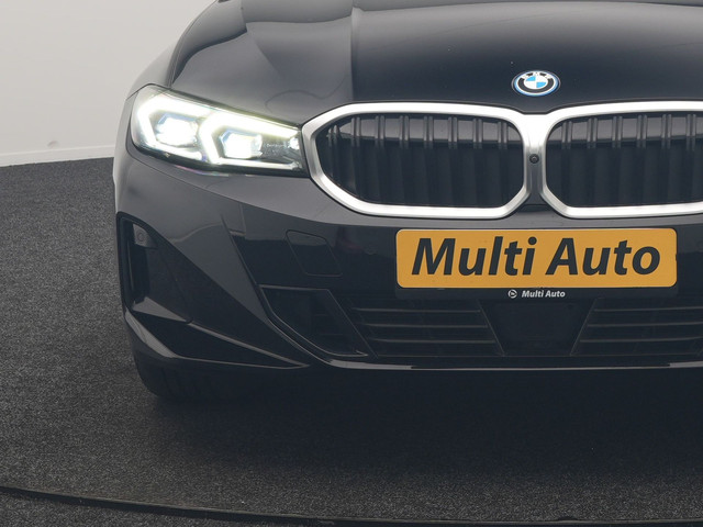 Foto 7 van BMW 3 Serie Touring 320e Luxury Line Facelift PHEV Dealer O.H. | Trekhaak Af Fabriek | Panodak | Hea
